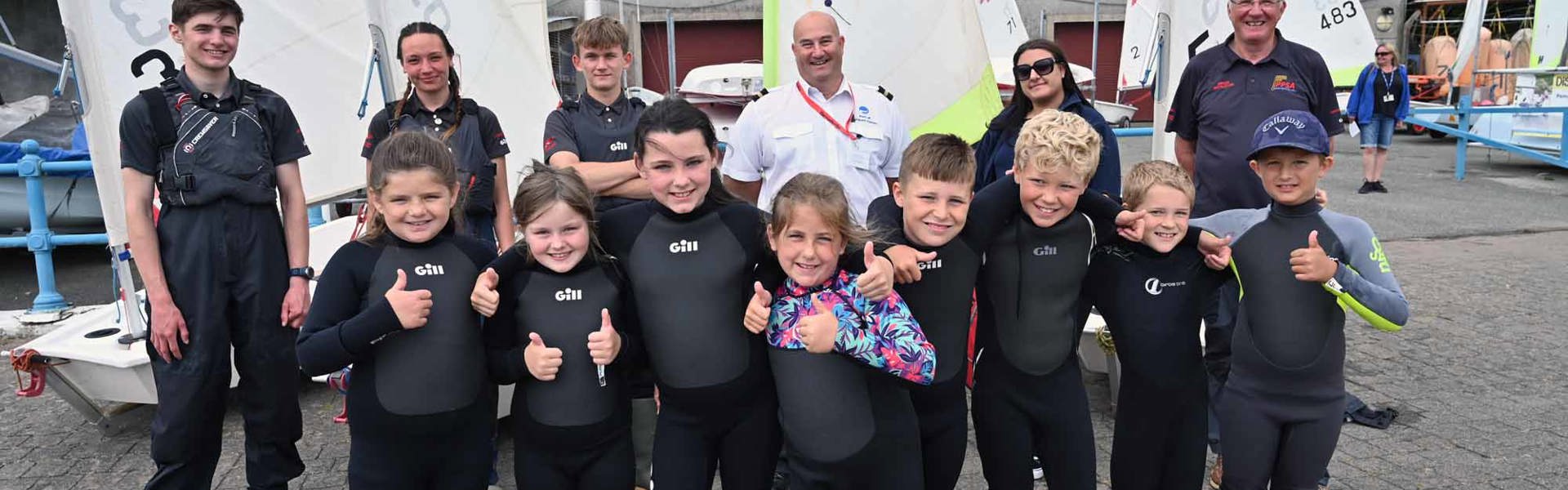 Brian Macfarlane And Hollie Phillips From The Port Of Milford Haven With The Team From The PPSA And Pupils Who All Received Sailing Certificates