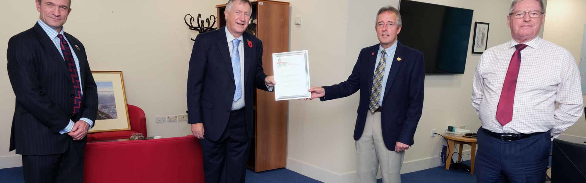 Will Bramble CBE, Chief Executive of Pembrokeshire County Council; Robert Newsome OBE, Chair of Ambassadors for DofE in Wales; Chris Martin, Chair of the Port of Milford Haven and Leader of Pembrokeshire County Council, Councillor David Simpson, at the certificate presentation at County Hall.
