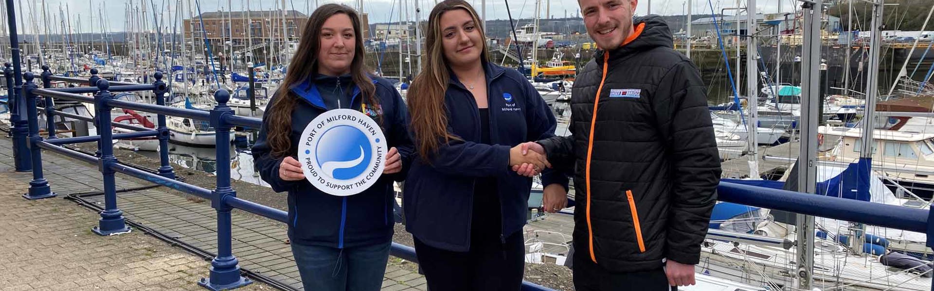 02.03.23 (Left To Right) Ro Hurley From Milford Youth Matters; Hollie Phillips Of The Port Of Milford Haven And Dayle Gibby From Milford Youth Matters Meet To Celebrate The Partnership