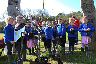 Pupils at Pembroke Dock Community School planted trees as part of the Coastal Community Growing Together project.