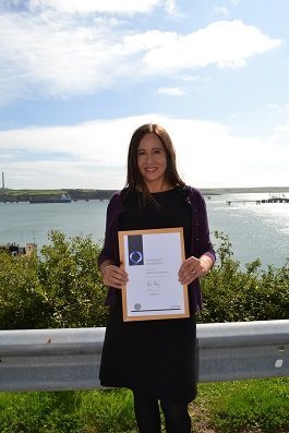 Vidette Swales, HR Director at the Port of Milford Haven, with the Investors In People certificate