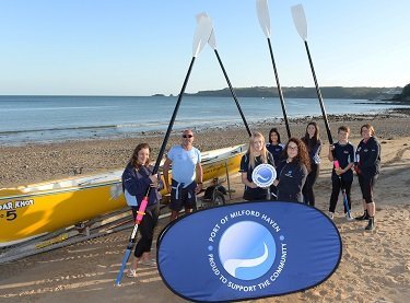 Kailea Turner, Stakeholder Engagement Officer at the Port, meets Phil Thomas and Gabi Slaughter of Wisemans Bridge Rowing Club along with junior rowers and their new oars.