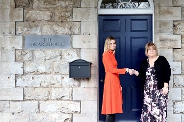 Leanne Thomas from Greenaway Scott and Melanie Jenkins from the Port of Milford Haven outside the new premises